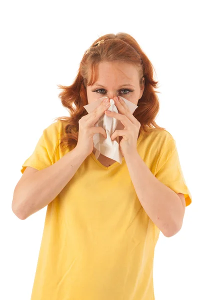 Red haired woman blowing nose — Stock Photo, Image