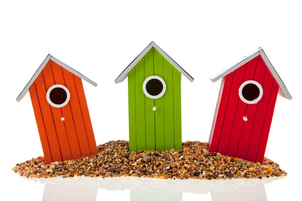 Bird houses and seed — Stock Photo, Image