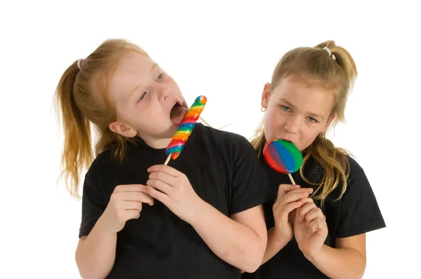 Girls with lollipops — Stock Photo, Image