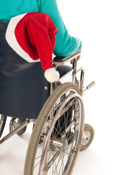 Persona en silla de ruedas con Navidad — Foto de Stock