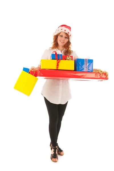 Vrouw met vele Kerstcadeaus — Stockfoto