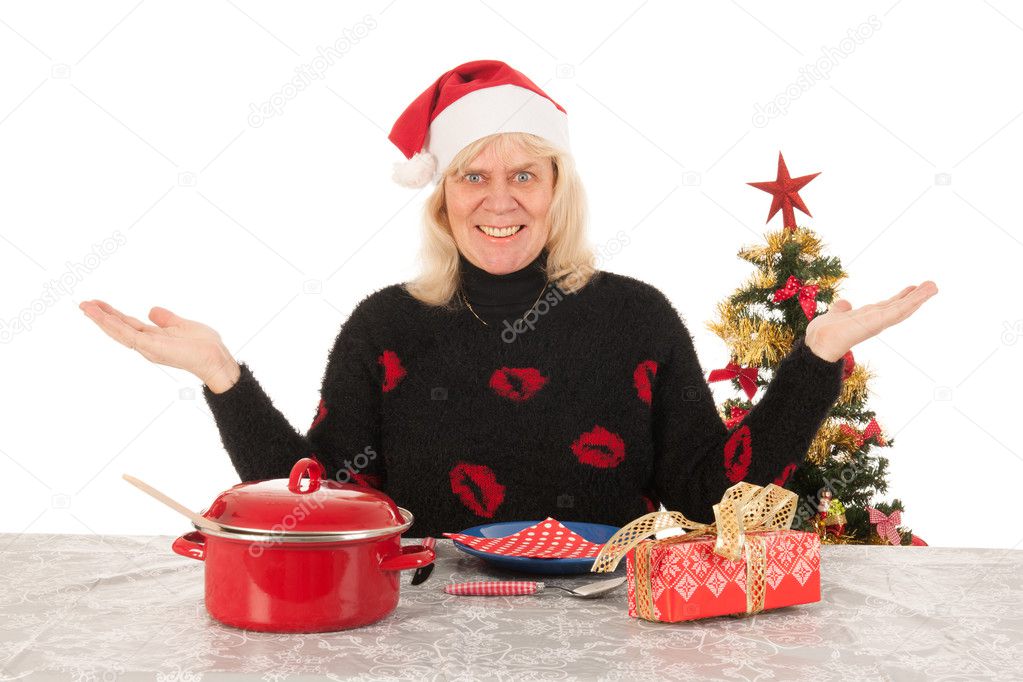 Woman of mature age happy alone with Christmas
