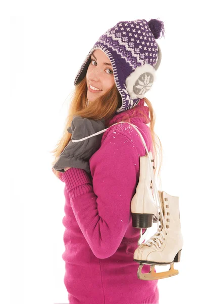 Aantrekkelijke vrouw met ijs-of rolschaatsen — Stockfoto