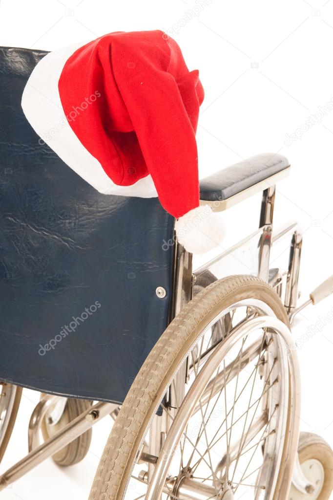 wheel chair with hat Santa Claus