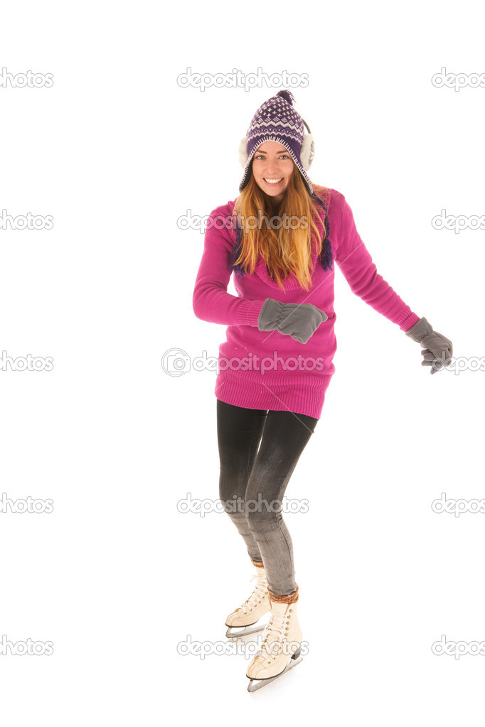 Attractive woman skating on ice