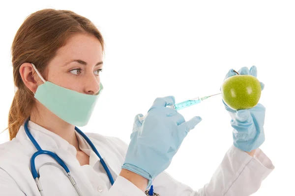 Doctor with syringe and medicine for apple — Stock Photo, Image