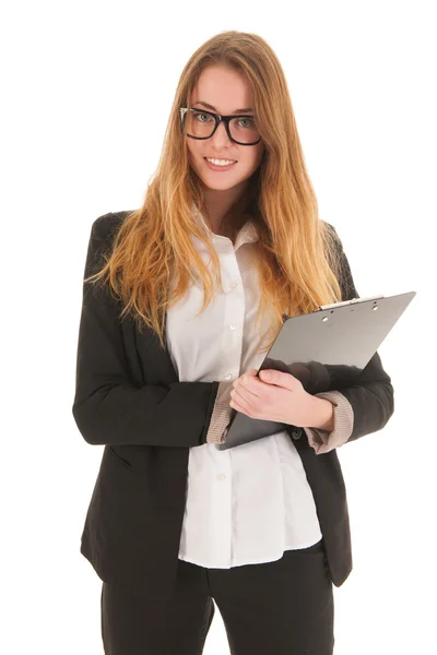 Blond business woman writing on clipboard — Stock Photo, Image