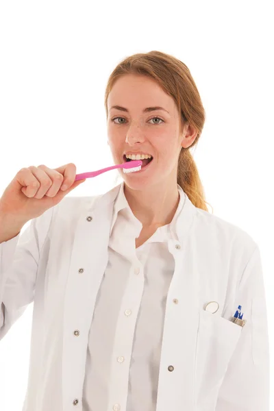 Female dentist with tooth bruhs — Stock Photo, Image