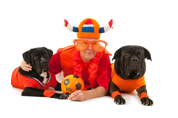 Man with his dogs as Dutch soccer supporters — Stock Photo, Image