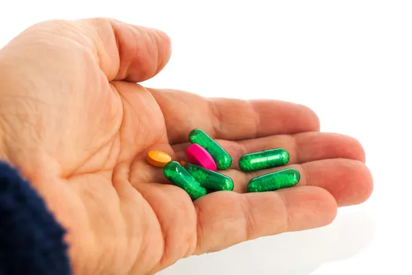 Green medicine in capsules — Stock Photo, Image