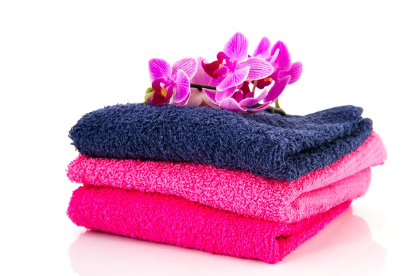 Handdukar och blommor — Stockfoto