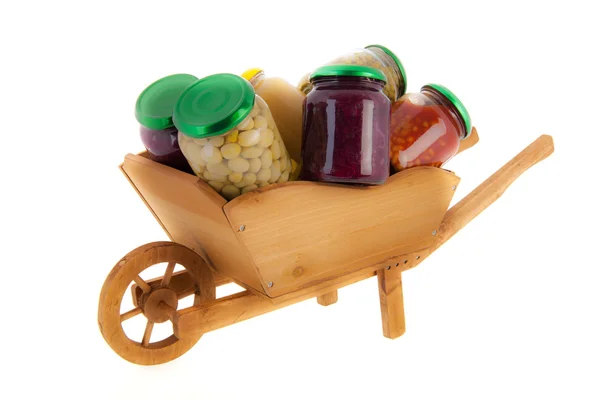 Carretilla de rueda conservas verduras — Foto de Stock