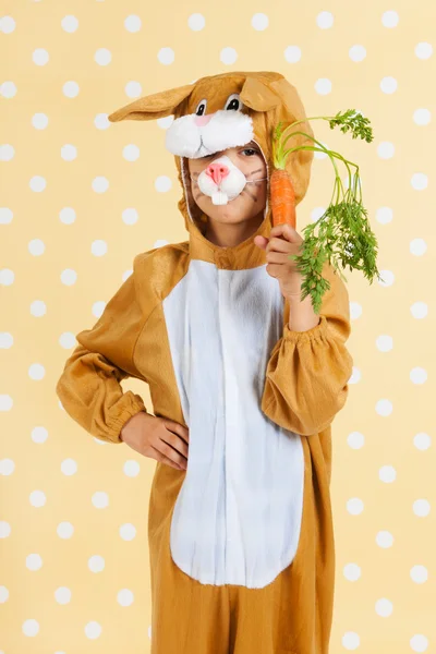 Child as easter hare with carrot — Stock Photo, Image