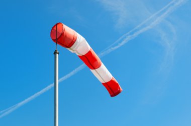 Red and white windsock clipart