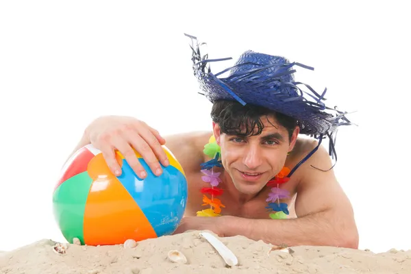 Jonge man op het strand — Stockfoto