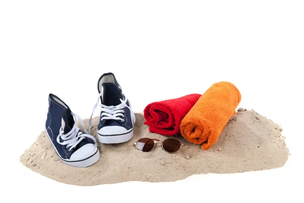 Strand mit Sand und Handtüchern — Stockfoto