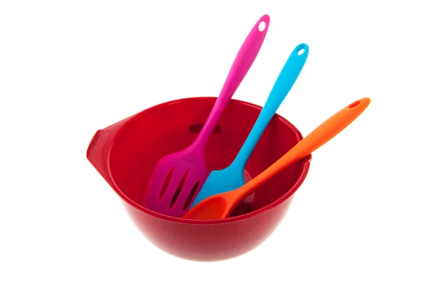 Red bowl with spoons — Stock Photo, Image