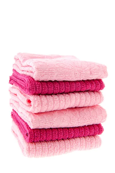 Gestapelde roze handdoeken — Stockfoto