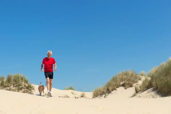 Runing with dog in nature — Stock Photo, Image