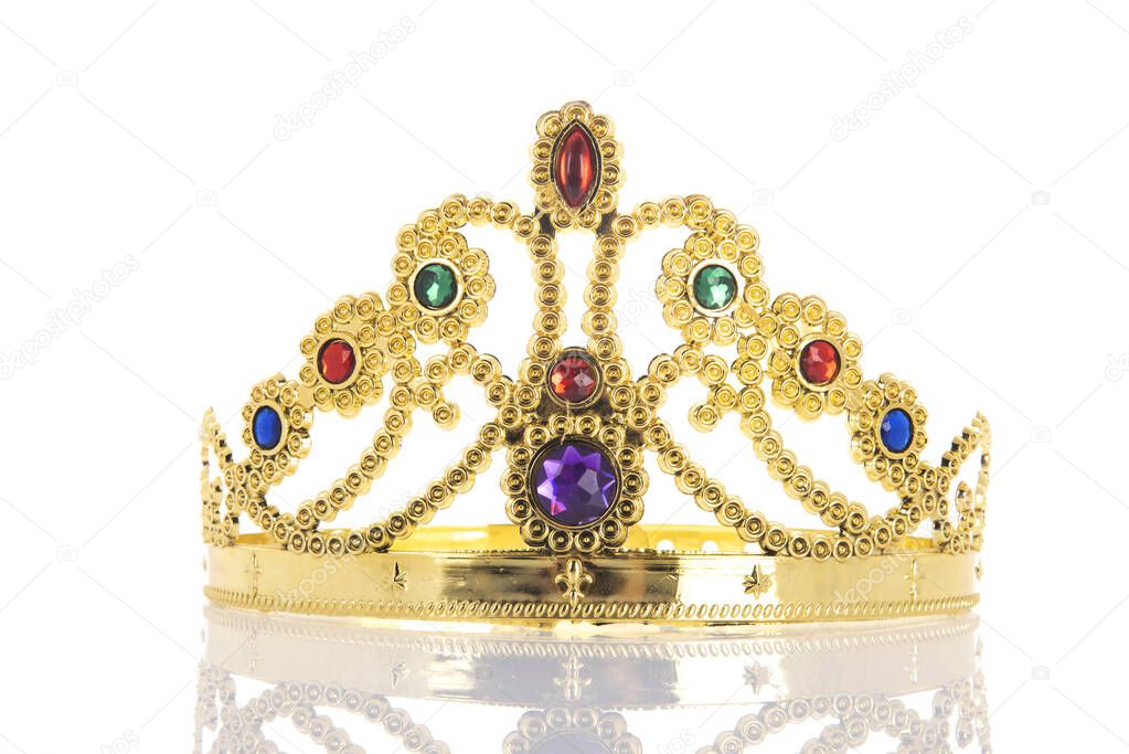 Golden crown with diamonds isolated over white background