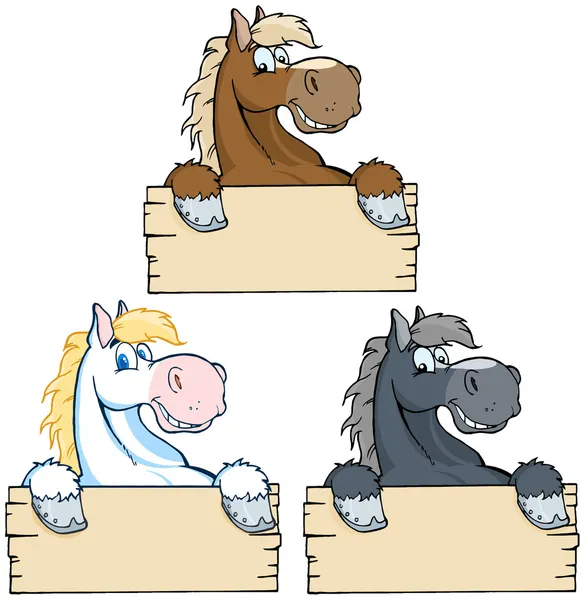 Набор лошадей с деревянным знаком — стоковое фото