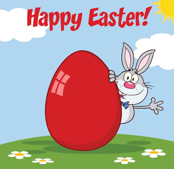 Feliz Pascua de conejo gris carácter ondeando detrás del huevo — Foto de Stock