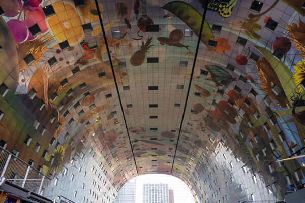Rotterdam, Netherlands - Feb 12, 2022: the colourful painted arch ceiling of the Markthal - famous market hall in central Rotterdam