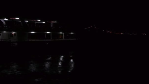 Transport ship leaves from port at night — Stock Video