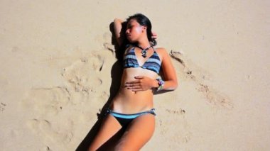 http://st.depositphotos.com/1007172/2301/v/380/depositphotos_23019386-Sexy-Asian-Girl-at-Exotic-Beach-Sunbathing-and-Tanning.jpg