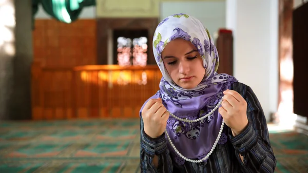 Muslim girl praying Royalty Free Stock Images