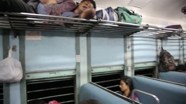 People travelling in train carriage — Stock Video