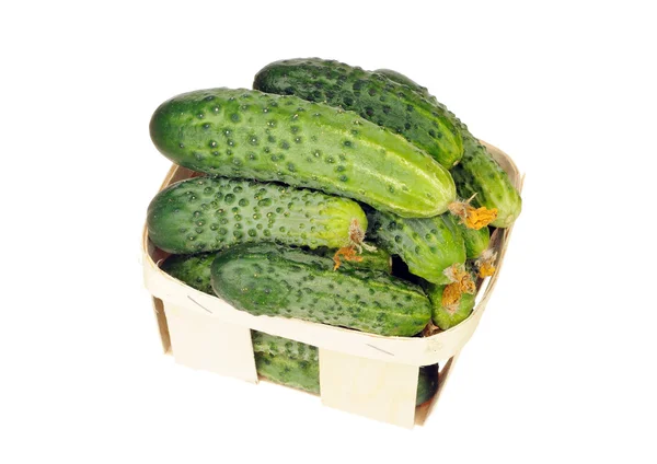 Pile of cucumber in a veneer basket isolated — Stock Photo, Image