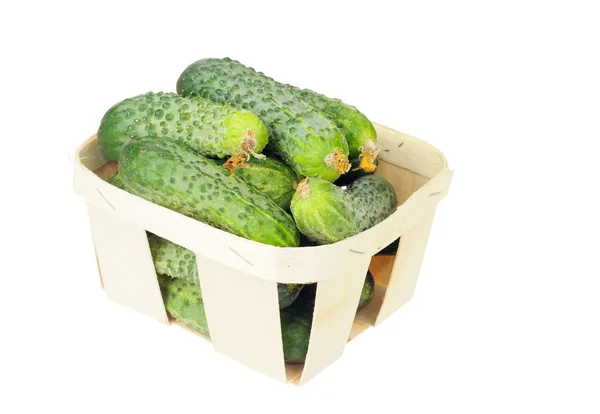 Pile of cucumber in a veneer basket isolated — Stock Photo, Image