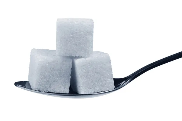 Cucchiaio con cubetti di zucchero — Foto Stock