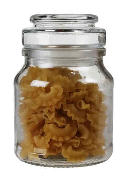 Closed jar with raw pasta — Stock Photo, Image