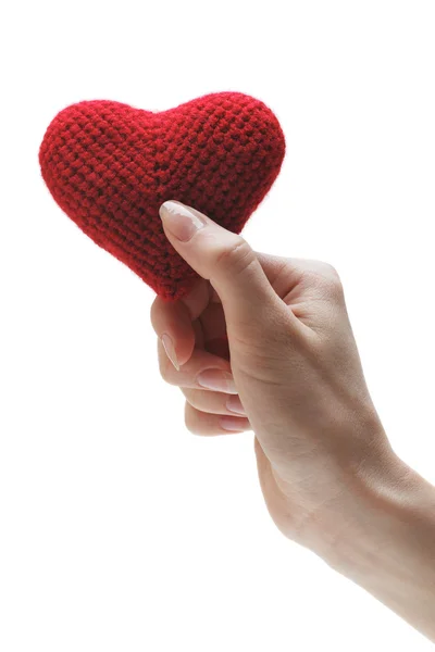 Handmade red heart in a woman — Stock Photo, Image