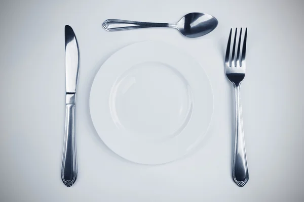 Piatto, forchetta, coltello e cucchiaio — Foto Stock