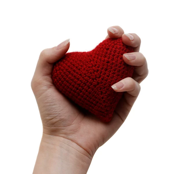 Coração vermelho artesanal em uma mulher — Fotografia de Stock