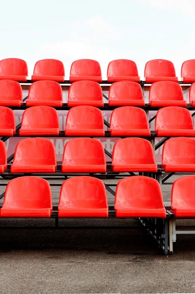 A stadionban piros ülőhely Jogdíjmentes Stock Képek