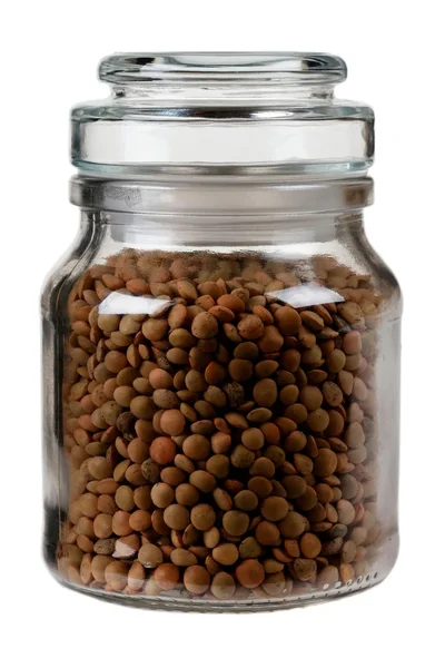 Closed jar with lentils. isolated on white background Stock Image