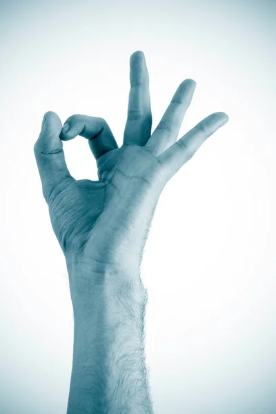 La mano muestra el signo OK aislado sobre un fondo blanco —  Fotos de Stock
