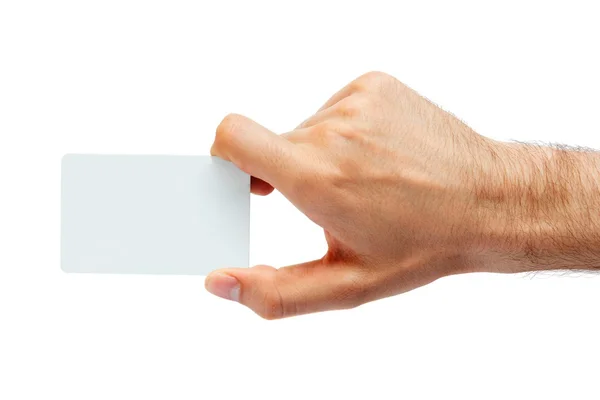Пластикова картка в руці людини. Студія ізольована Ліцензійні Стокові Зображення