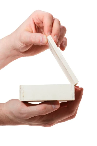 Hands opening a small box isolated on a white background — Stock Photo, Image