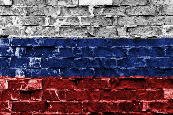 Flaga Rosji malowane na ścianie z cegły — Zdjęcie stockowe