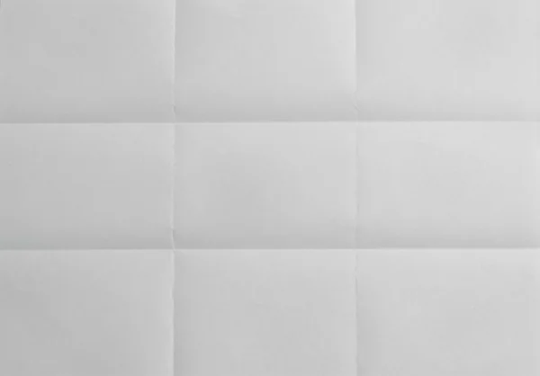 Dobrado em nove folhas de papel em branco — Fotografia de Stock