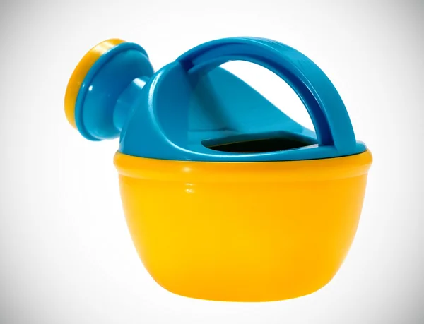 Blue and yellow watering can — Stock Photo, Image