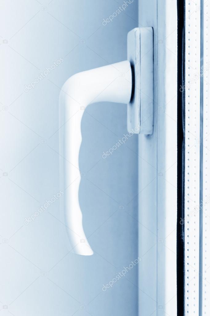 White PVC window's handle