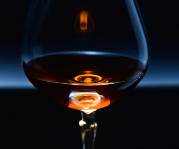 Snifter with brandy — Stock Photo, Image