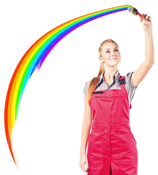 Woman in red overalls with painting brush — Stock Photo, Image