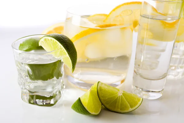 Drinks with lemon and lime — Stock Photo, Image